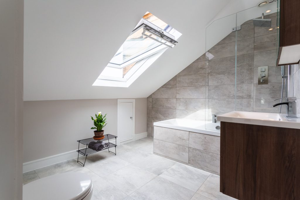 Loft bathroom renovation Scotland sloped ceiling and skylight