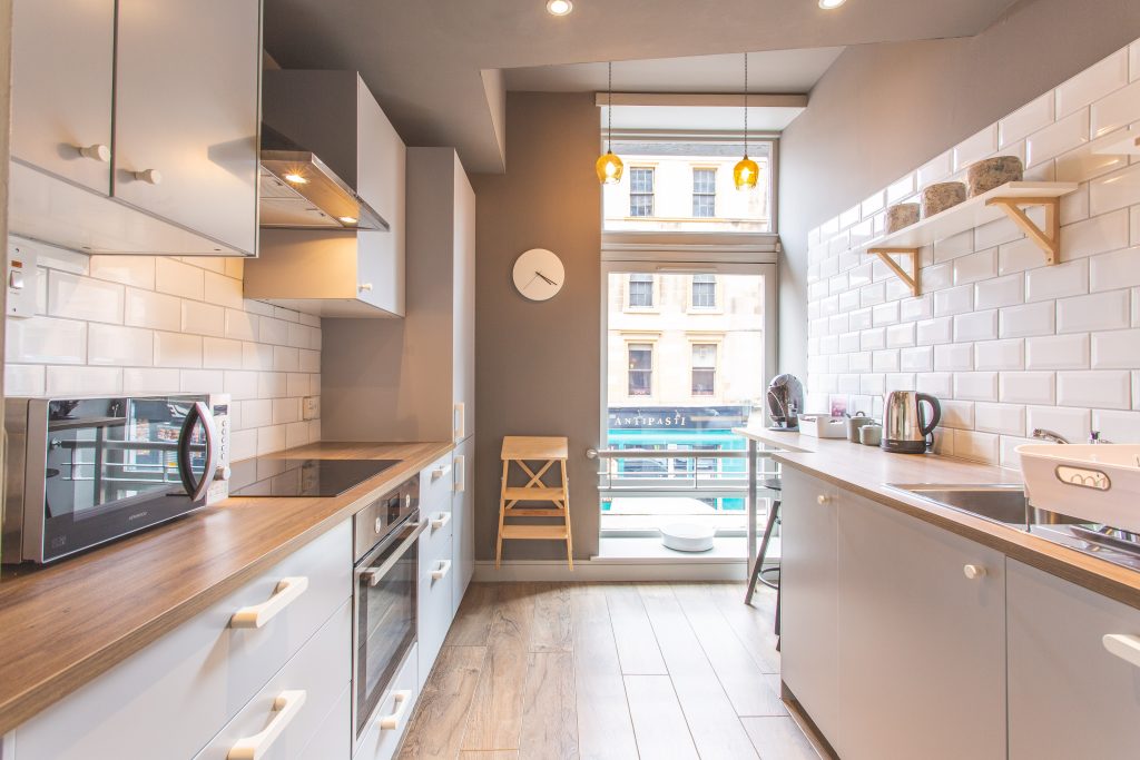Kitchen renovation Scotland narrow modern layout with fitted units